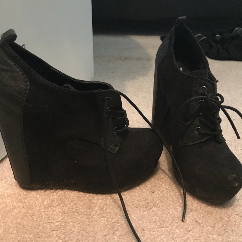Black wedge booties